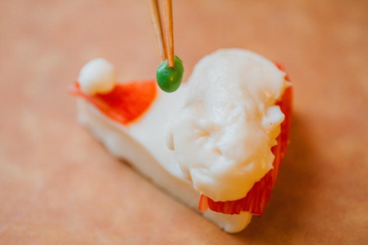 Santa's cheese and reindeer inari sushi bento