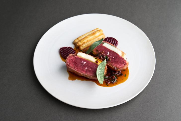 Beef tenderloin Saltimbocca with sage butter sauce